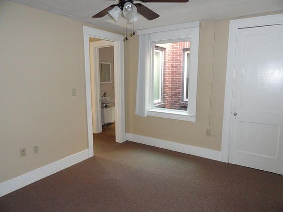 Living room with internal window well (very cool).