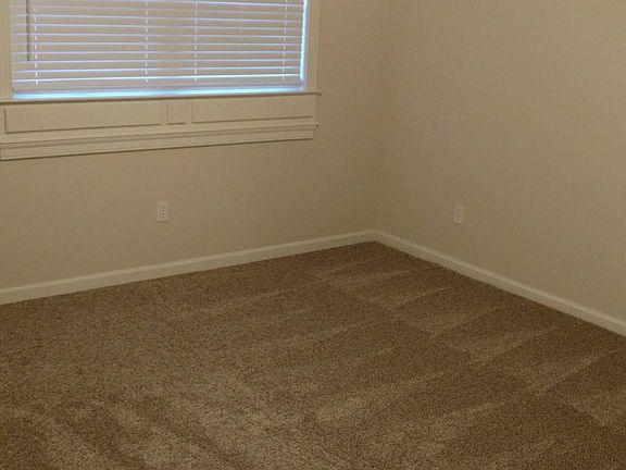 Ceiling fans and 2" faux wood blinds throughout home.