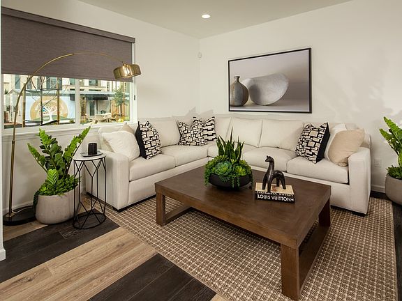 With an open layout, it seamlessly connects to the kitchen and dining area. It creates an atmosphere