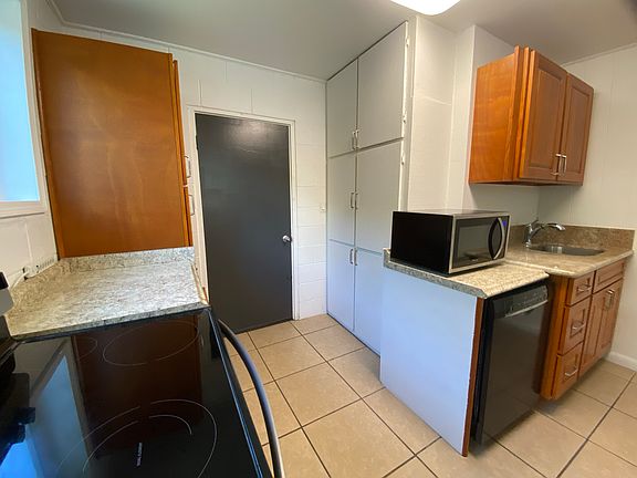 Current Kitchen setup- Being replaced with a whole new layout, new cabinets, new countertops, windows replaced and new appliances!