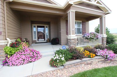 Large covered front entry and porch.
