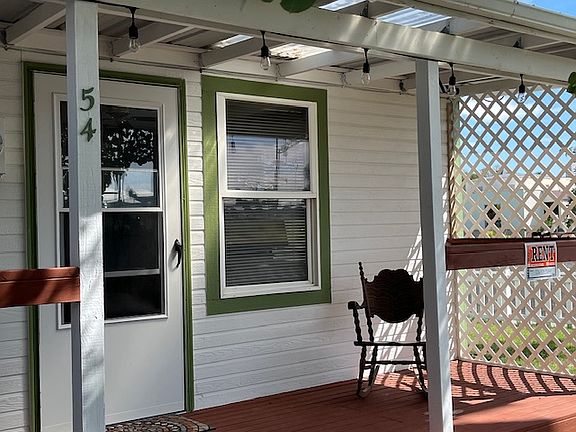 Cozy front deck to rock away your evenings