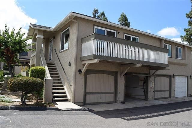 Detached one car garage below unit.