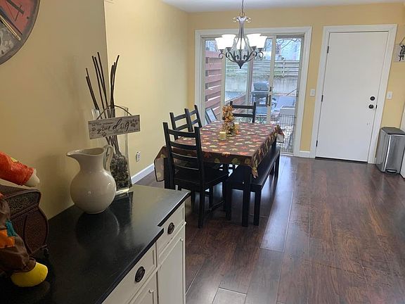 Yellow walls have been painted grey and new floors have been installed