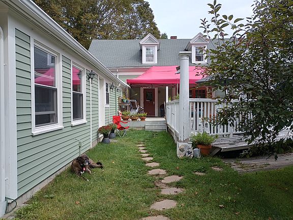 Entrance to unit 2- Under the red awning