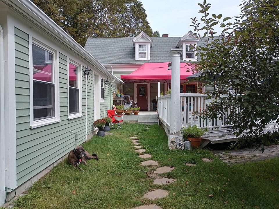 Entrance to unit 2- Under the red awning