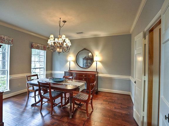 Engaging Dinging Room entices loved ones to gather for a great meal with easy access to the Kitchen and Butler's Pantry.