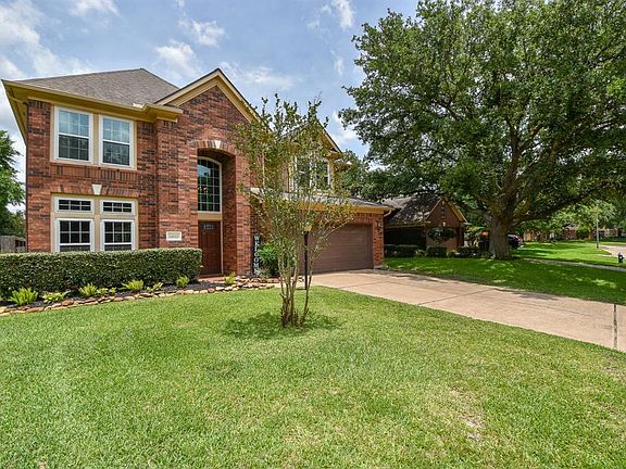 Welcome home to 14622 Hearthstone Meadows - a small gated cul-de-sac street in the golf course community of Hearthstone Country Club. Many updates throughout this lovely home including double paned windows, custom blinds downstairs, remodeled kitchen