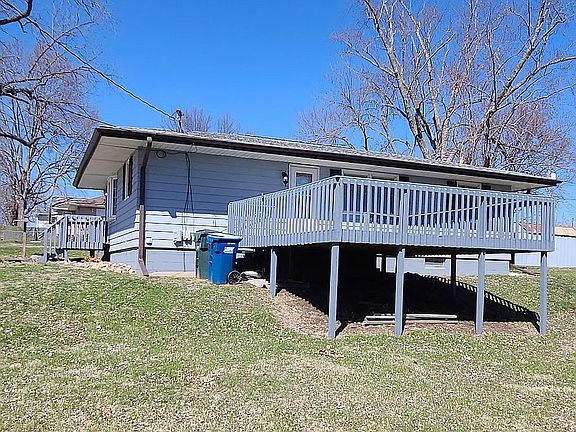 Left side of house with deck