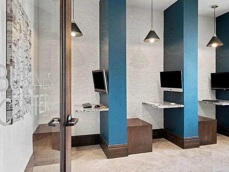 Business center with PCs, iMac and printer