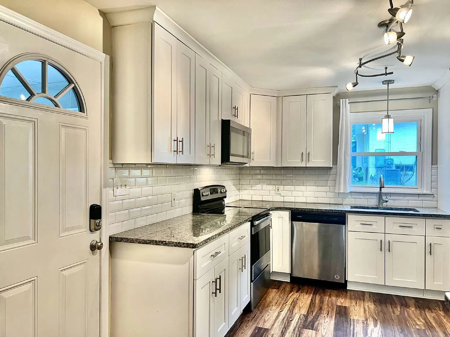 Updated Ranch In Prime Location — Photo 4