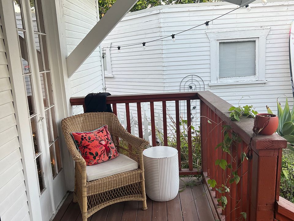 Other side of deck and entrance to side yard path in back