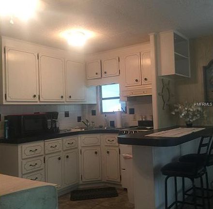 4th image of 8219 Robert St
