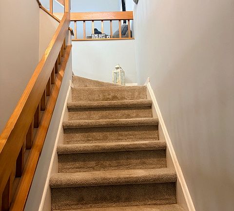 Stairs going up to living room