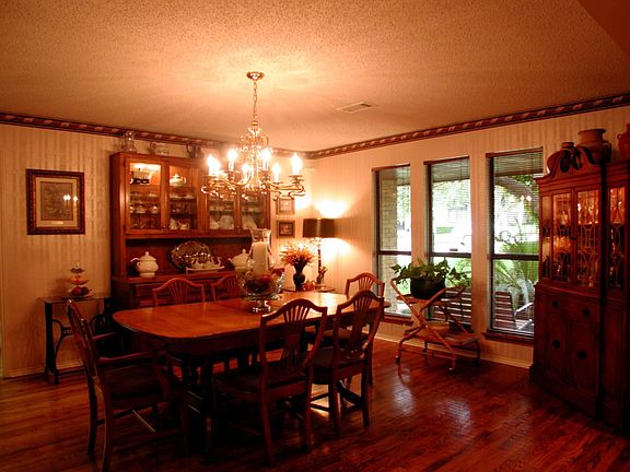 Open Dining Room w/China Cabinet and Hardwood Floors