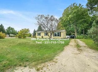5635 Old Maple Trl, Grawn, MI 49637