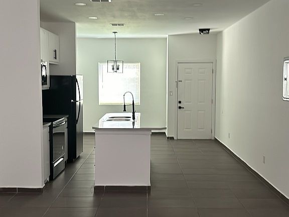 Entrance - Living room, Kitchen, & Dinning