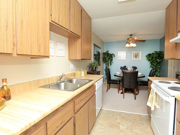 Walk-through kitchen with great cabinet space