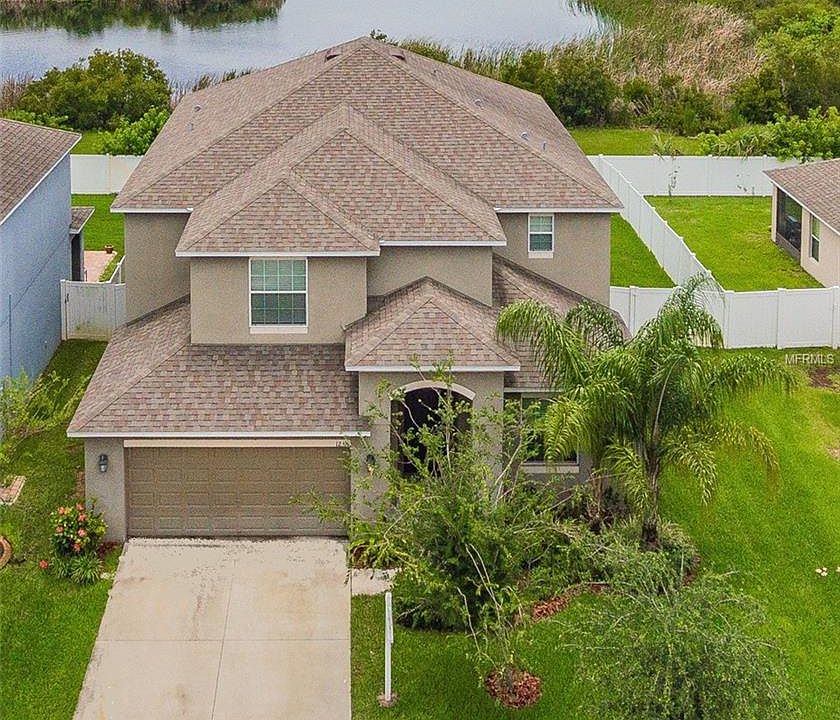 1st image of 12319 Holmwood Greens Pl
