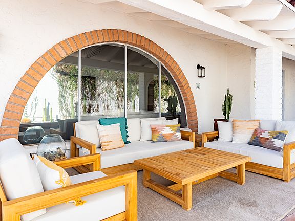 Outside front patio area. Covered