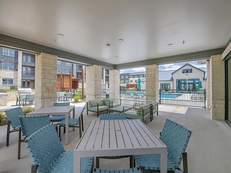 Unwind in the inviting outdoor space at Sage at Celina Residences, where stylish seating and serene views enhance your leisure time. Perfectly designed for relaxation and connection, come see it for yourself today!