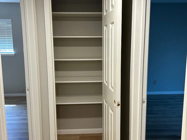 Lg storage closet between guest bedrooms