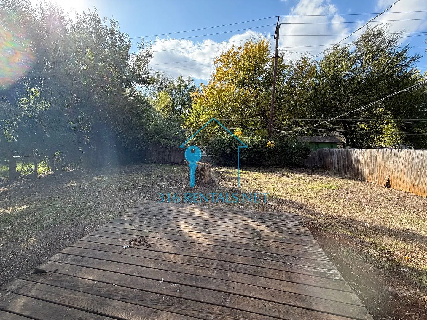 $1,245 | 4 Bed Wichita Home | Hardwood Floors, Fenced Yard & Deck | Pets OK — Photo 2