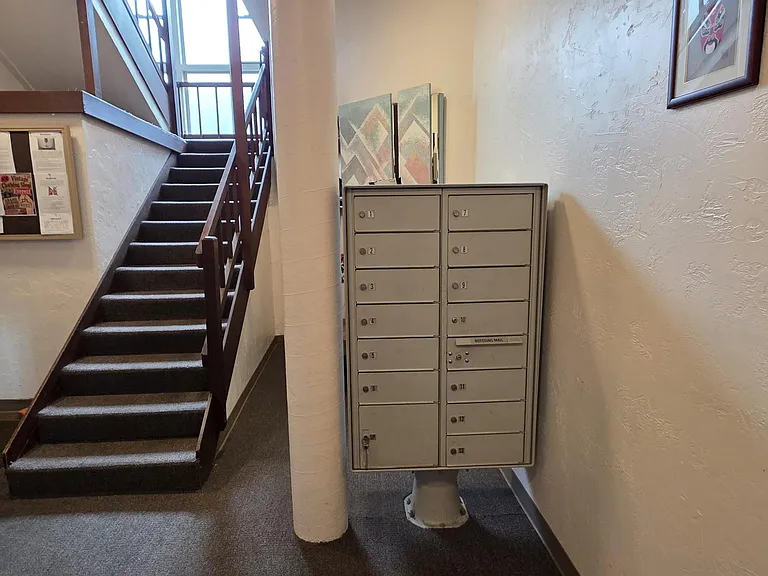 Interior stairwell with mailbox area