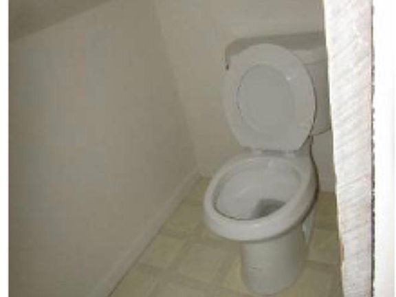 1/2 bathroom. Sink outside of this room.