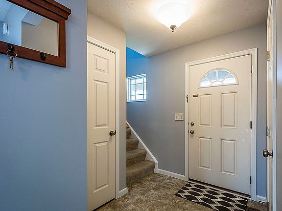 Welcoming Foyer w/ Half Bath