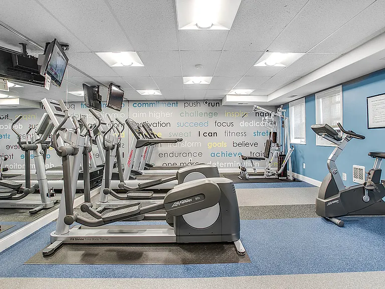 Fitness center with treadmills, machines and free weights