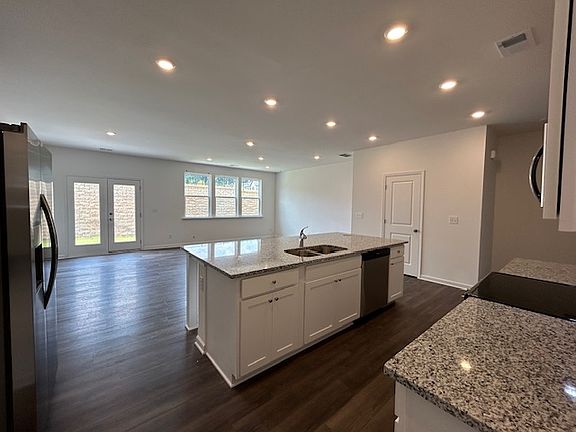 Large family room with lots of sunlight and ventilation