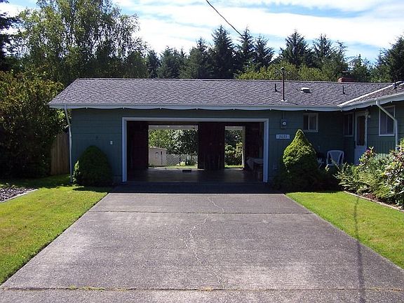 Large front drive way for parking and drive through to back yard.