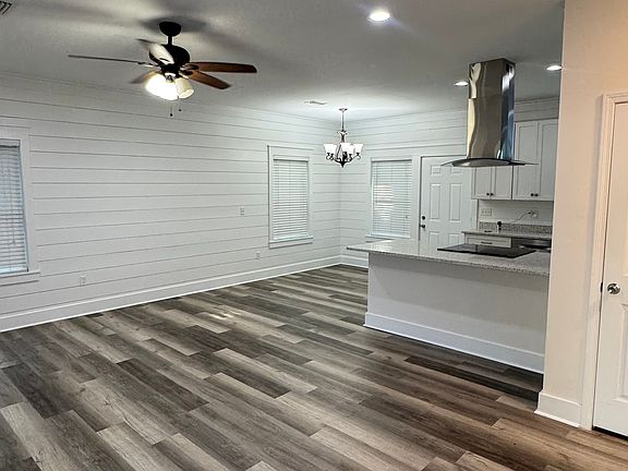 View of the living room and kitchen from the front door