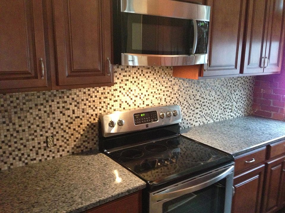 Updated kitchen with oven, fridge, dishwasher