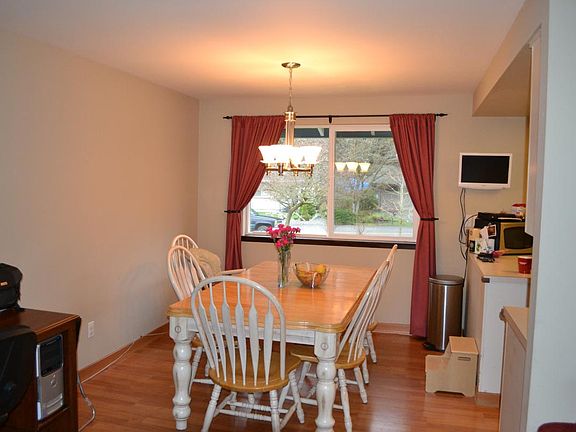 4th image of 2880 SE Forest Villa Ct