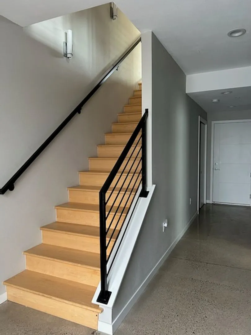 Spacious 3-Bedroom Townhome with Modern Finishes & Private Deck — Photo 2
