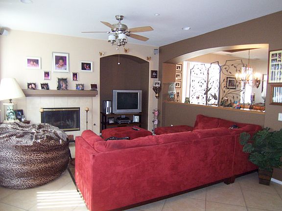 The living area is comfortable and relaxing... notice the cozy fireplace! 
