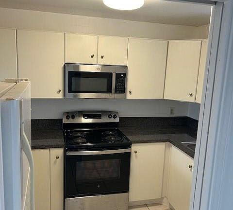 4th image of 9400 Live Oak Place #406