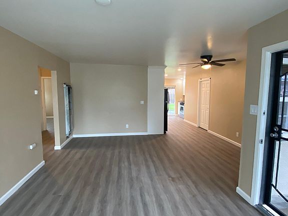 Living room/dinning room looking toward beautiful kitchen