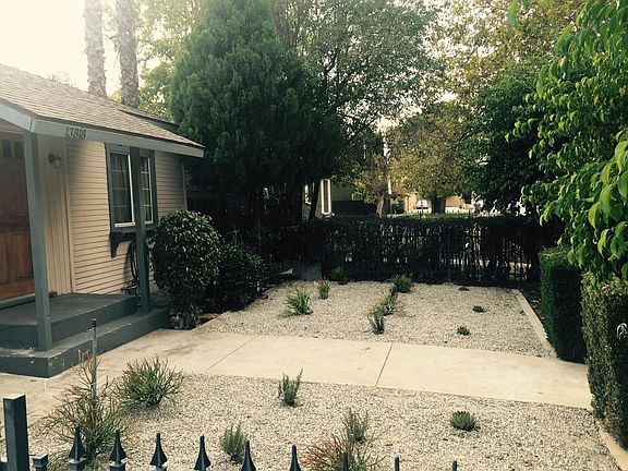 fenced in west part of front yard