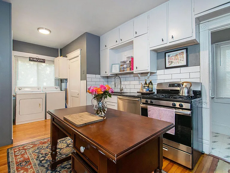 Kitchen with pantry, laundry, and bathroom