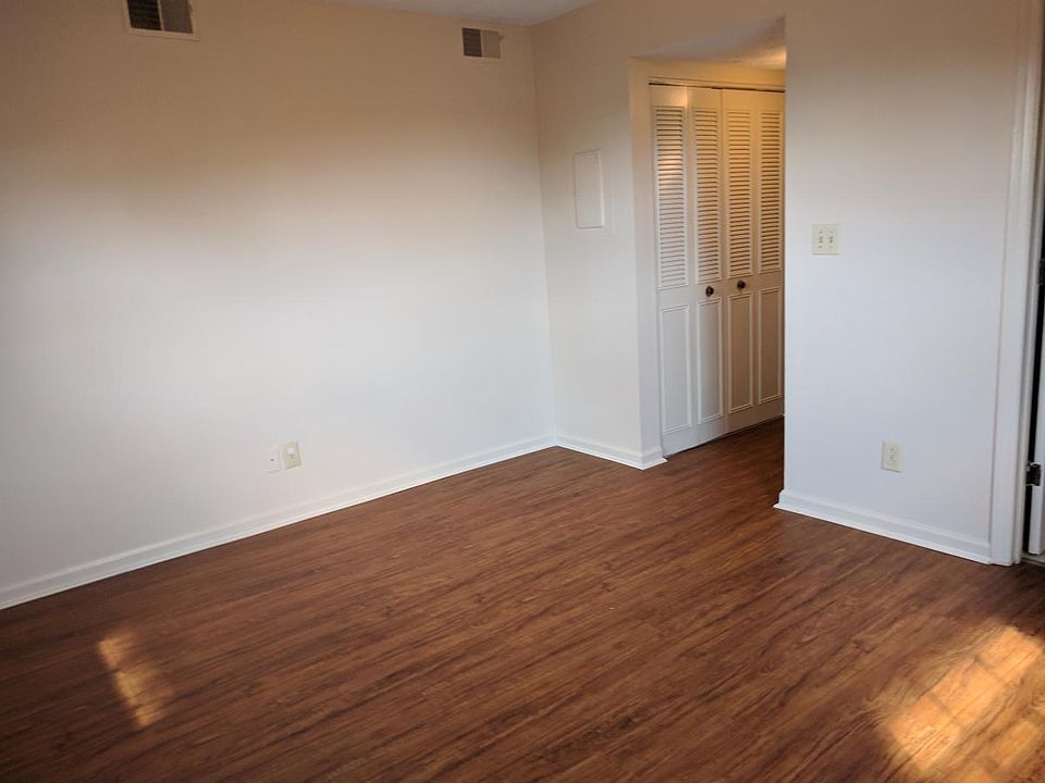 Master Bedroom with view to hall and closets