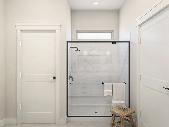 Primary bath with glass shower enclosure- Artist Rendering