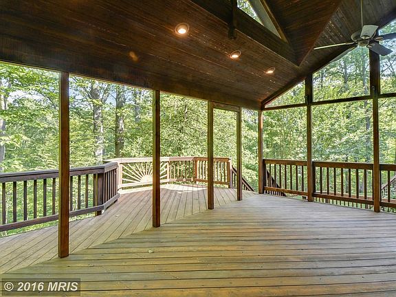 Large porch with removable screens off family room
