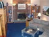 cosy fam rm with brick hearth