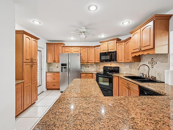 4th image of 7 N Greenway Village N #111