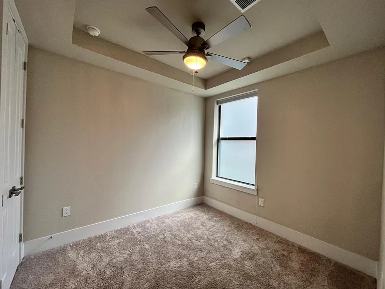 Third bedroom (ground floor) with privacy glass and blackout blinds