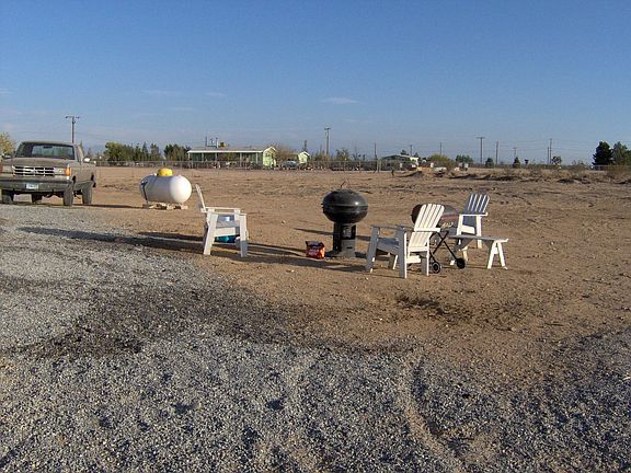 Backyard with view of neighboring homes in the distance