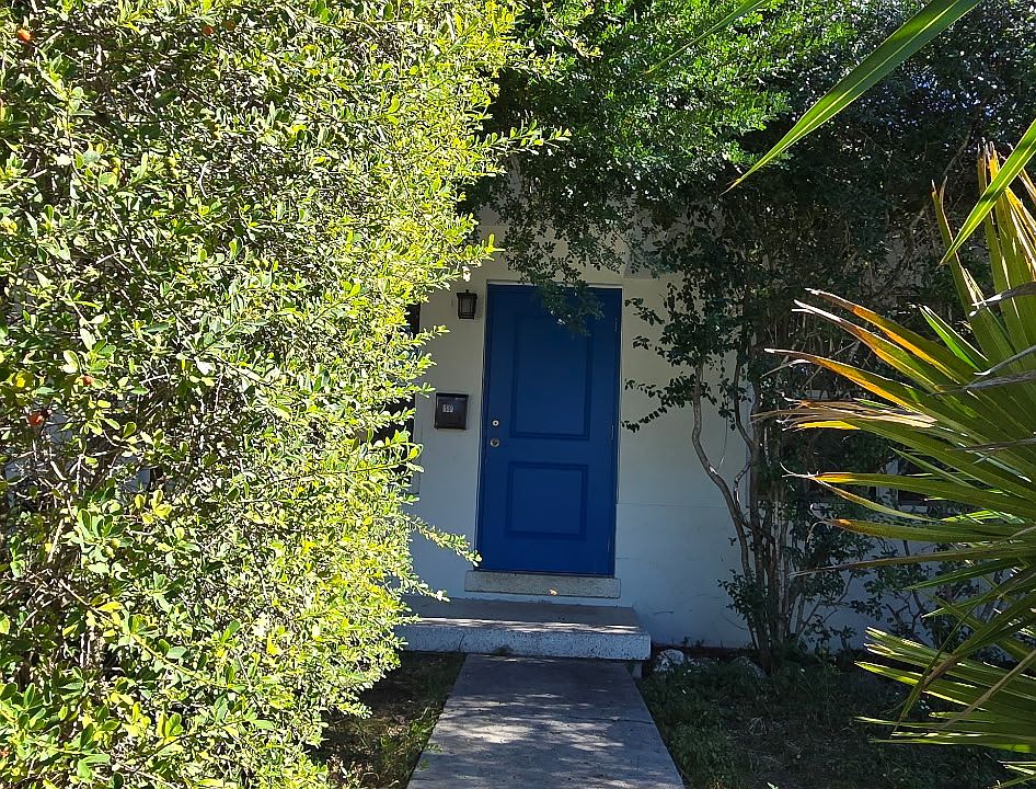 Native landscaped garden with one parking space